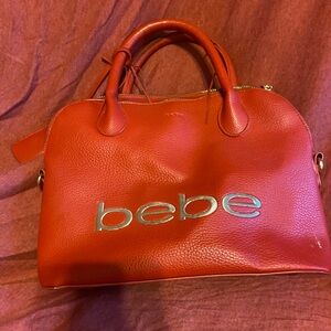 Bebe Bold Red Satchel with Silver Logo